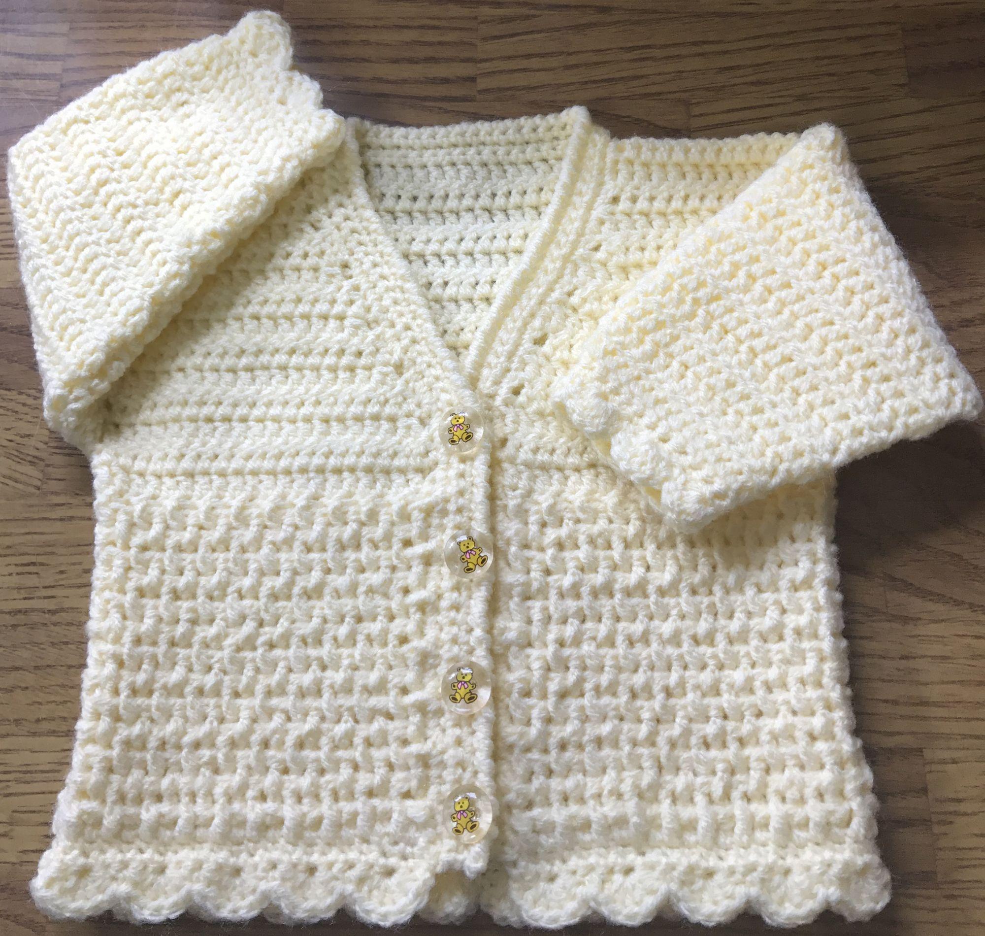 Birth to 2 years 1039 Baby Crochet Pattern for a Shaped Edge Cardigan in DK 