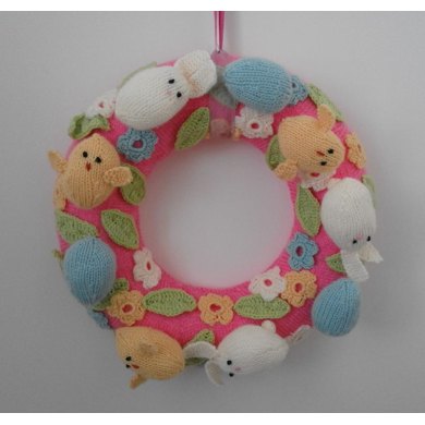 Knitted Easter wreath with chicks and bunnies