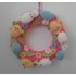 Knitted Easter wreath with chicks and bunnies