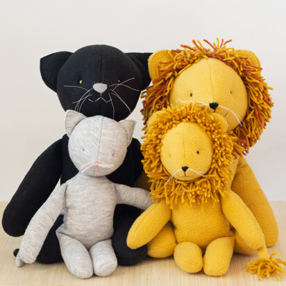 Stuffed cat and lion